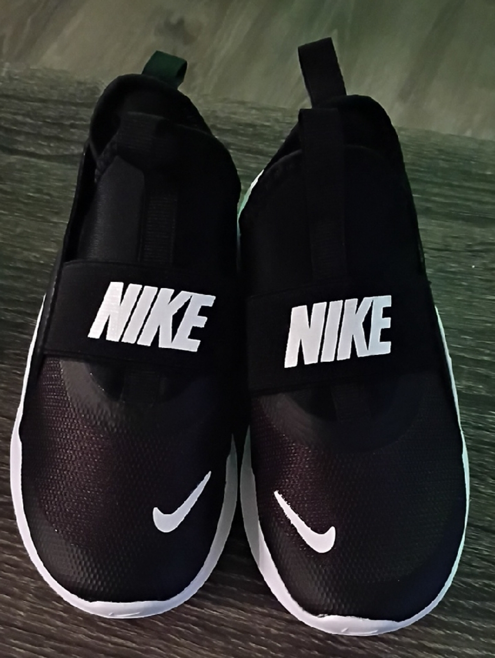 Nike Black Slip-On Trainers with White Swoosh